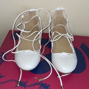 White tie up shoes